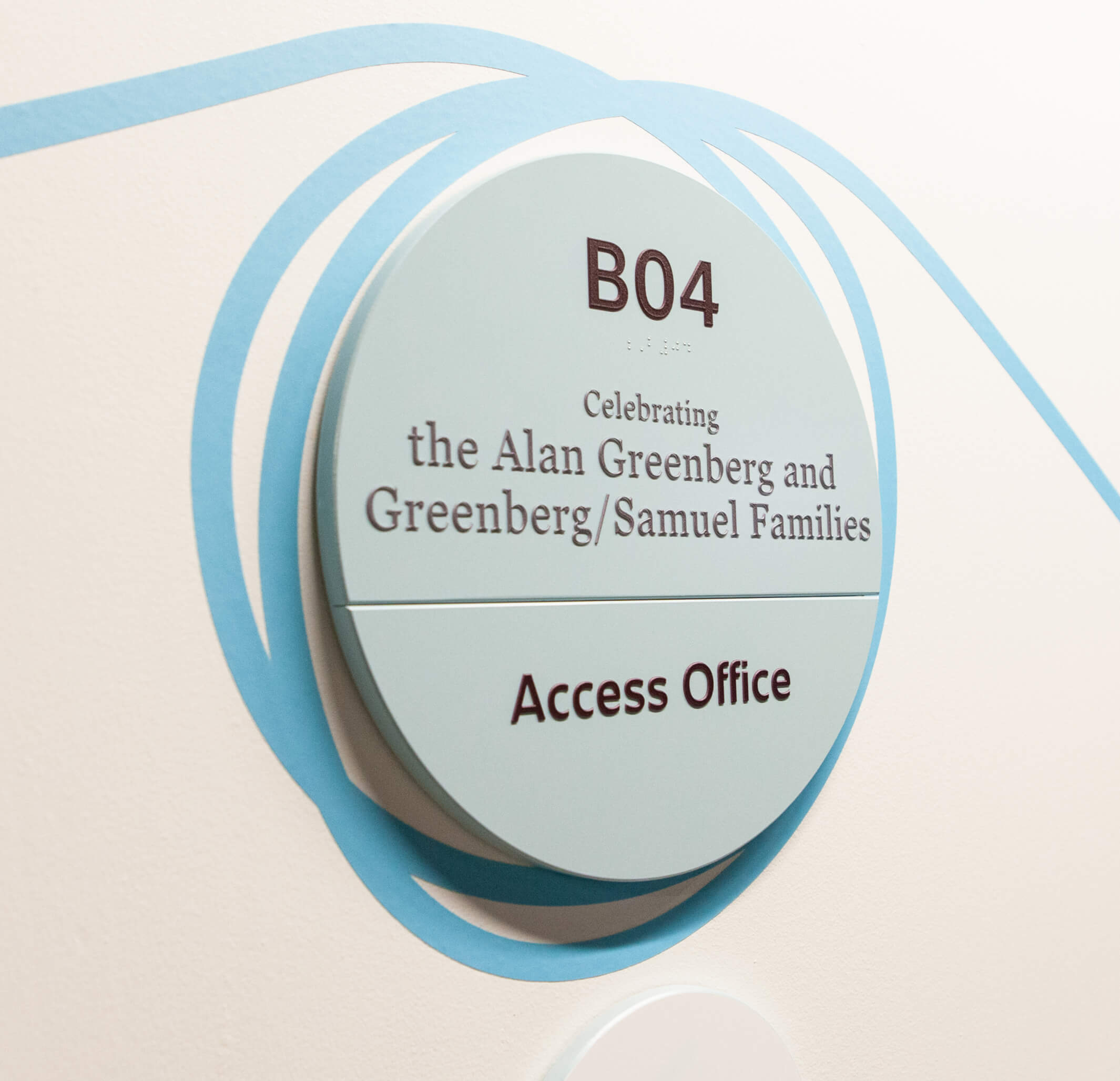 Close-up of donor recognition and room signage.